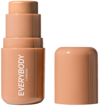 Kremowy bronzer w sztyfcie Everybody London, odcień Light. Otwarty, beżowy sztyft i nakrętka obok.