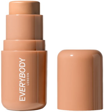 Kremowy bronzer w sztyfcie Everybody London, odcień Light. Otwarty, beżowy sztyft i nakrętka obok.