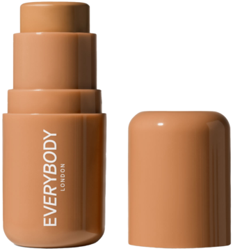 Bronzer w sztyfcie Everybody London w odcieniu Medium, widok z przodu. Sztyft stoi obok otwartej nakrętki.