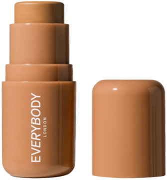 Bronzer w sztyfcie Everybody London w odcieniu Medium, widok z przodu. Sztyft stoi obok otwartej nakrętki.