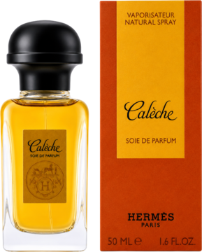 Hermès Calèche Soie De Parfum 50ml. Przezroczysta butelka z płynem i pomarańczowe opakowanie, z przodu.