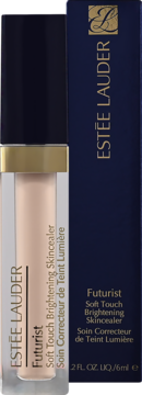 Estée Lauder Futurist Soft Touch Brightening Skincealer: beżowa tubka z złotym paskiem, obok granatowego pudełka, widok z przodu.