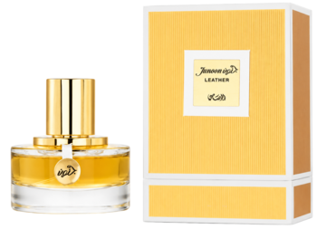 Rasasi Junoon Leather woda perfumowana w szklanej butelce ze złotym korkiem obok złotego pudełka, widok przód.