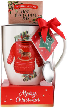 Zestaw świąteczny: biały kubek z czerwonym swetrem i konikiem, łyżeczka, gorąca czekolada waniliowa w proszku, w czerwonym pudełku.