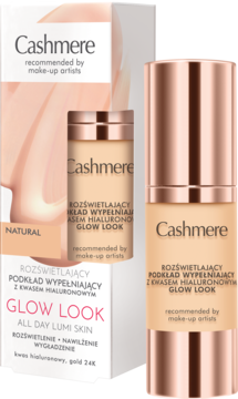 Podkład Cashmere Glow Look z kwasem hialuronowym w beżowej butelce z różowym złotem, obok kartonowe opakowanie, widok z przodu.