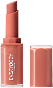 Ciepła cynamonowo-nudowa pomadka Plumping Lipstick Everybody London, otwarta, z wysuniętym sztyftem i obok odłożoną skuwką.