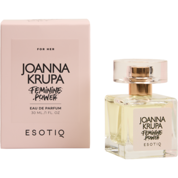 Esotiq Joanna Krupa Feminine Power Eau de Parfum. Jasnoróżowe pudełko i szklany flakon z złotym płynem.