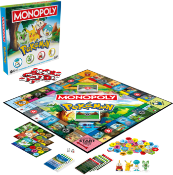 Monopoly Pokemon, gra planszowa z rozłożoną kolorową planszą, pudełkiem, figurkami Pokemon i kartami.