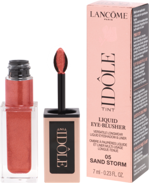 Otwarty Lancôme Idôle Tint Sand Storm, różowo-miedziany cień w płynie z aplikatorem i różowe pudełko.