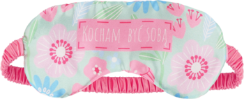 Eloy Opaska na oczy, wzór 2, w pastelowe kwiaty, z różowym napisem 'ROXANA RICCO' i marszczoną gumką, widok z góry.