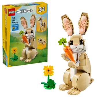 Złożony model LEGO Creator 3-in-1: beżowy królik z marchewką i kwiatem, obok pudełko zestawu na żółtym tle.