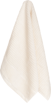 Kremowy, prążkowany ręcznik z bawełny frotte, zawieszony pionowo. Widoczny gładki brzeg na dole.