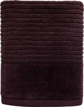 Złożony ciemnobrązowy ręcznik kąpielowy frotte. Górna część ma poziome prążki, dolna jest gładka.