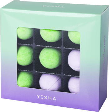 Zestaw kul do kąpieli Yesha: 6 zielonych (Korzenne Przyprawy) i 3 jasnofioletowe (Lawenda & Pomarańcza) w pudełku.