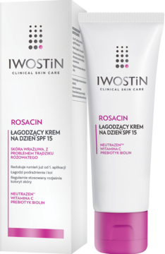 Biała tubka i pudełko kremu Iwostin Rosacin SPF 15, z różowymi akcentami, widok z przodu na neutralnym tle.