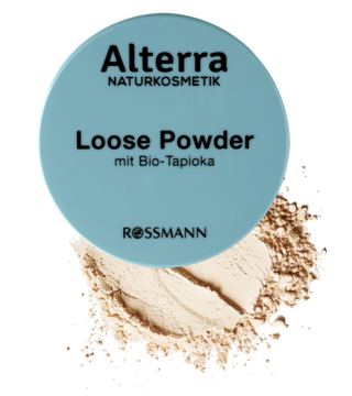 Puder sypki Alterra Loose Powder 01 Light, jasnoniebieska nakrętka i rozsypany beżowy puder matujący.