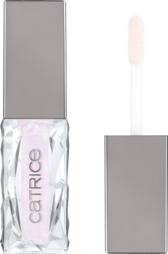 Błyszczyk do ust Catrice, jasnoróżowy z perłowym blaskiem, w przezroczystej fasetowanej butelce z aplikatorem obok.