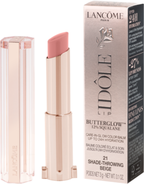 Lancôme Idôle Squalane-12 Butterglow, pomadka w odcieniu Shade-Throwing Beige, obok różowego pudełka.
