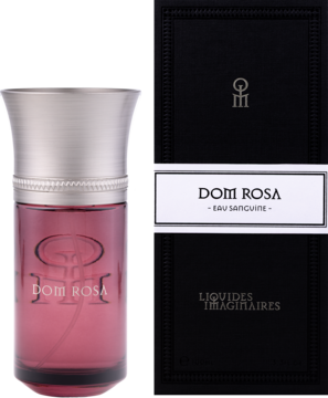 Woda perfumowana Liquides Imaginaires Dom Rosa: różowy flakon z korkiem, obok eleganckie czarne pudełko z etykietą, widok przód.
