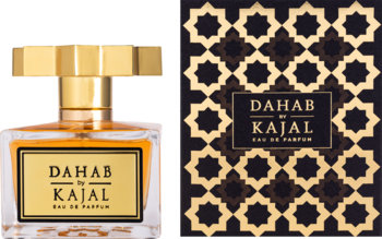 Kajal Dahab Eau de Parfum: złota butelka perfum i eleganckie pudełko z arabskim wzorem, widok z przodu.