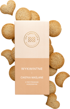 Beżowe opakowanie IGA SARZYŃSKA Ciastka Maślane z Przyprawami Korzennymi, otoczone złotymi ciastkami w kształcie serc.