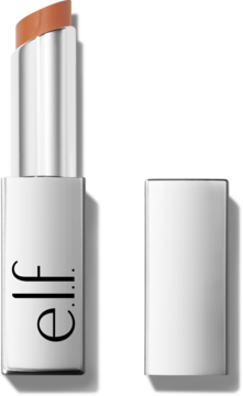 Balsam do ust e.l.f. w beżowym kolorze, wysunięty ze srebrnej tubki, z leżącą obok zatyczką, widok z przodu.