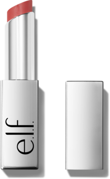 Szminka e.l.f. w odcieniu ciemnego różu, otwarta w srebrnym etui, obok metalowa zatyczka.