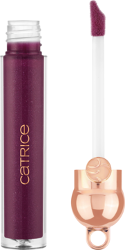 Błyszczyk Catrice Hollyglazing fioletowy C02. Otwarta butelka z brokatowym płynem, widoczny aplikator i złoty korek z zawieszką.