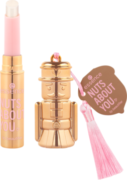 Balsam Essence Nuts About You i złoty dziadek do orzechów z różowym chwostem, obok siebie na pastelowym tle.