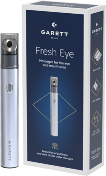 Masażer Garett Beauty Fresh Eye: srebrne urządzenie do oczu i ust obok białego pudełka produktu, widok z przodu.