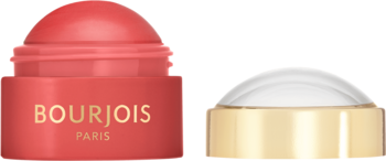 Koralowy róż Bourjois Little Round Pot Cream z logo, obok niego złoty słoik z białym kremem.