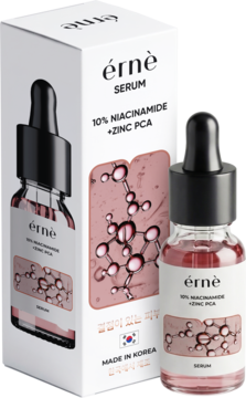 Serum érnè 10% Niacinamide + Zinc PCA w butelce z różowym płynem i białym pudełkiem, lekko pod kątem.