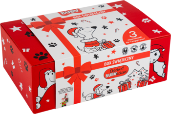Czerwono-biały BUBAlicious box świąteczny dla psa. Widok z góry na pudełko z grafiką psa, wstążką, karmą, gryzakiem, zabawką.