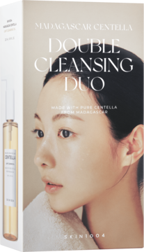 SKIN1004 Madagascar Centella Double Cleansing Duo, białe pudełko z portretem kobiety. Z boku widoczna butelka olejku.