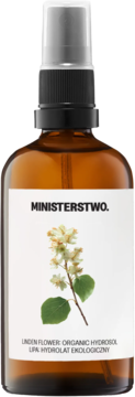 MINISTERSTWO. Ekologiczny hydrolat lipowy w bursztynowej butelce ze sprayem, widok z przodu, z kwiatami lipy.