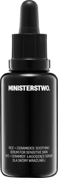 Czarna butelka serum Ministerstwo Ryż + Ceramidy, łagodzące do twarzy, z zakraplaczem, widok z przodu.