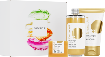 Eternal Gold Timeless Skin: rozświetlający balsam, nektar do kąpieli, mydło w złotych opakowaniach i karton prezentowy.