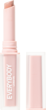 Jasnoróżowa pomadka Velvet Matte Everybody London, z aksamitnym wykończeniem, otwarta, obok nakrętki.