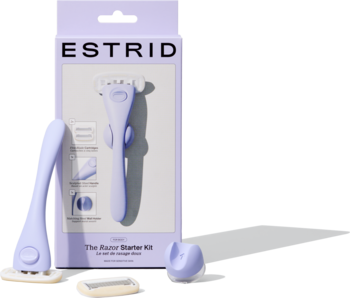 Zestaw startowy ESTRID w liliowym kolorze: maszynka, uchwyt i wymienne ostrze. Widok na pudełko i wyłożone akcesoria.