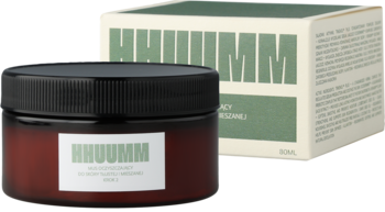 Hhuumm mus oczyszczający do cery tłustej, w bursztynowym słoiku z czarną nakrętką, widok z przodu, zielone pudełko w tle.