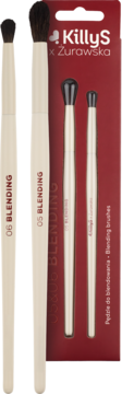 Dwa beżowe pędzle KillyS x Żurawska Blending (05 i 06) do cieni, widoczne obok czerwonego opakowania.