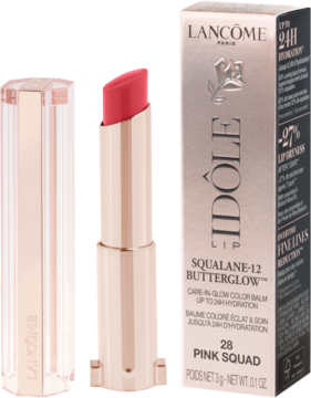Różowy balsam do ust Lancôme Idôle Squalane-12 Butterglow w otwartym, złotym etui obok opakowania.