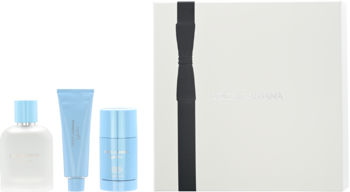 Zestaw Dolce&Gabbana Light Blue: perfumy, balsam i dezodorant w jasnoniebieskich opakowaniach, obok białego pudełka.