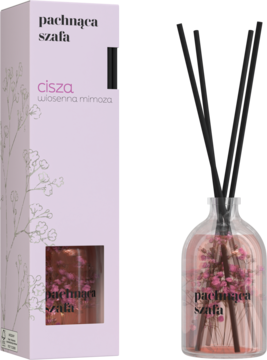 Dyfuzor zapachowy 'Cisza' wiosenna mimoza, butelka z różowym płynem i czarnymi patyczkami, obok pudełka z mimozą.