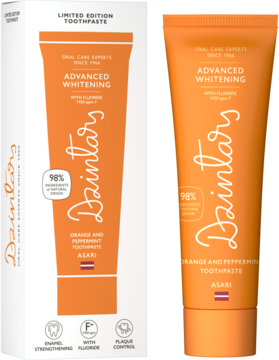 Limitowana edycja pasty Dzintars Advanced Whitening: pomarańczowa tuba i białe pudełko, smak pomarańcza i mięta.