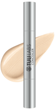 Srebrny korektor Tuli Labs Concealer w sztyfcie z kremowym swatch'em w odcieniu Light, widok z przodu.