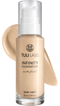 Matujący podkład do twarzy Tuli Labs Infinity Silky Light w butelce, widoczna beżowa smuga.