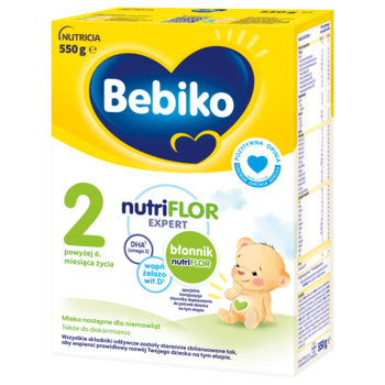 Mleko następne Bebiko 2 nutriFLOR EXPERT z błonnikiem 550g, biało-żółte opakowanie z misiem, widok z przodu.