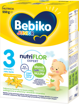 Żółto-białe opakowanie Bebiko Junior 3 o smaku waniliowym, 550g, z misiem i błonnikiem nutriFLOR INULINA.
