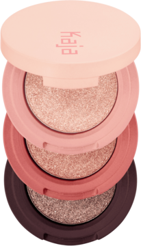 Kaja Beauty Bento, trio cieni Orange Blossom: trzy stacked, błyszczące odcienie od brzoskwini do brązu.